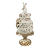 Torta Decorativa su Piedistallo con Conigli Resina Bianco Rosa Ø20x45cm | Clayre & Eef