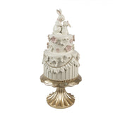 Torta Decorativa su Piedistallo con Conigli Resina Bianco Rosa Ø20x45cm | Clayre & Eef